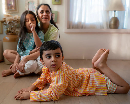 ‘Sleepover Party’ unisex cotton set with peach yellow striped kurta and peach green striped shorts